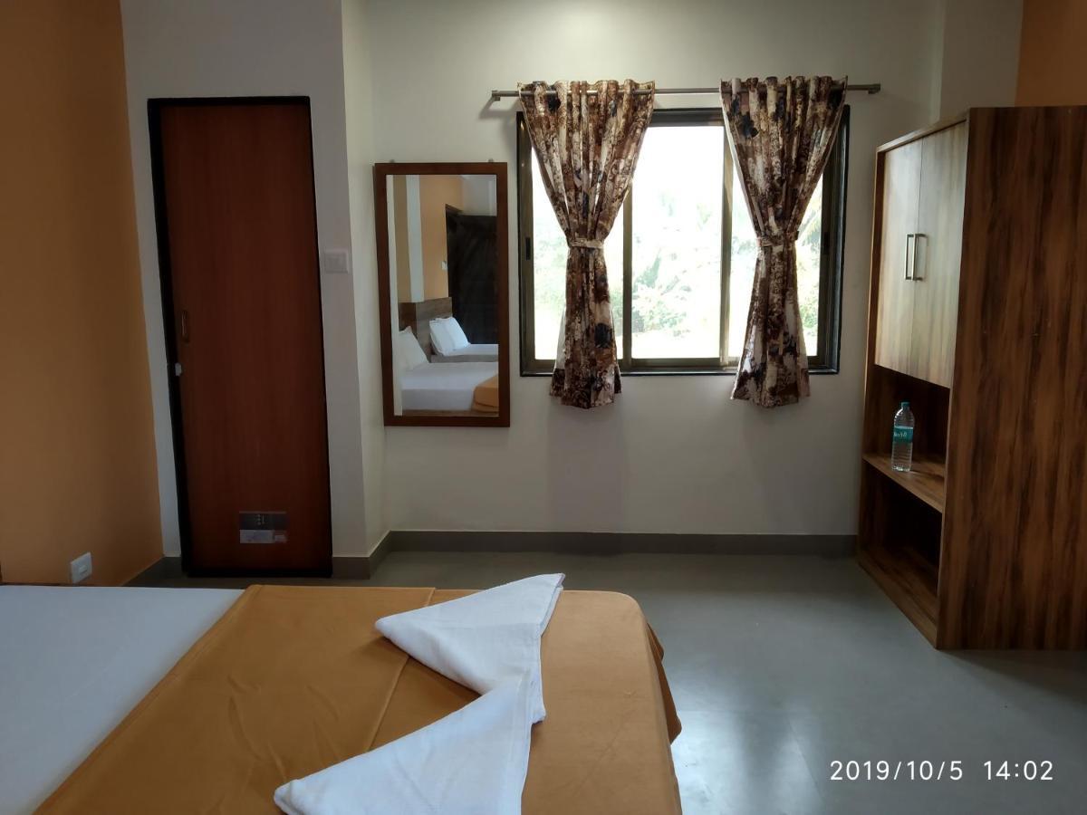 Lotus Hotel Nagaon Beach Alibag Bagian luar foto