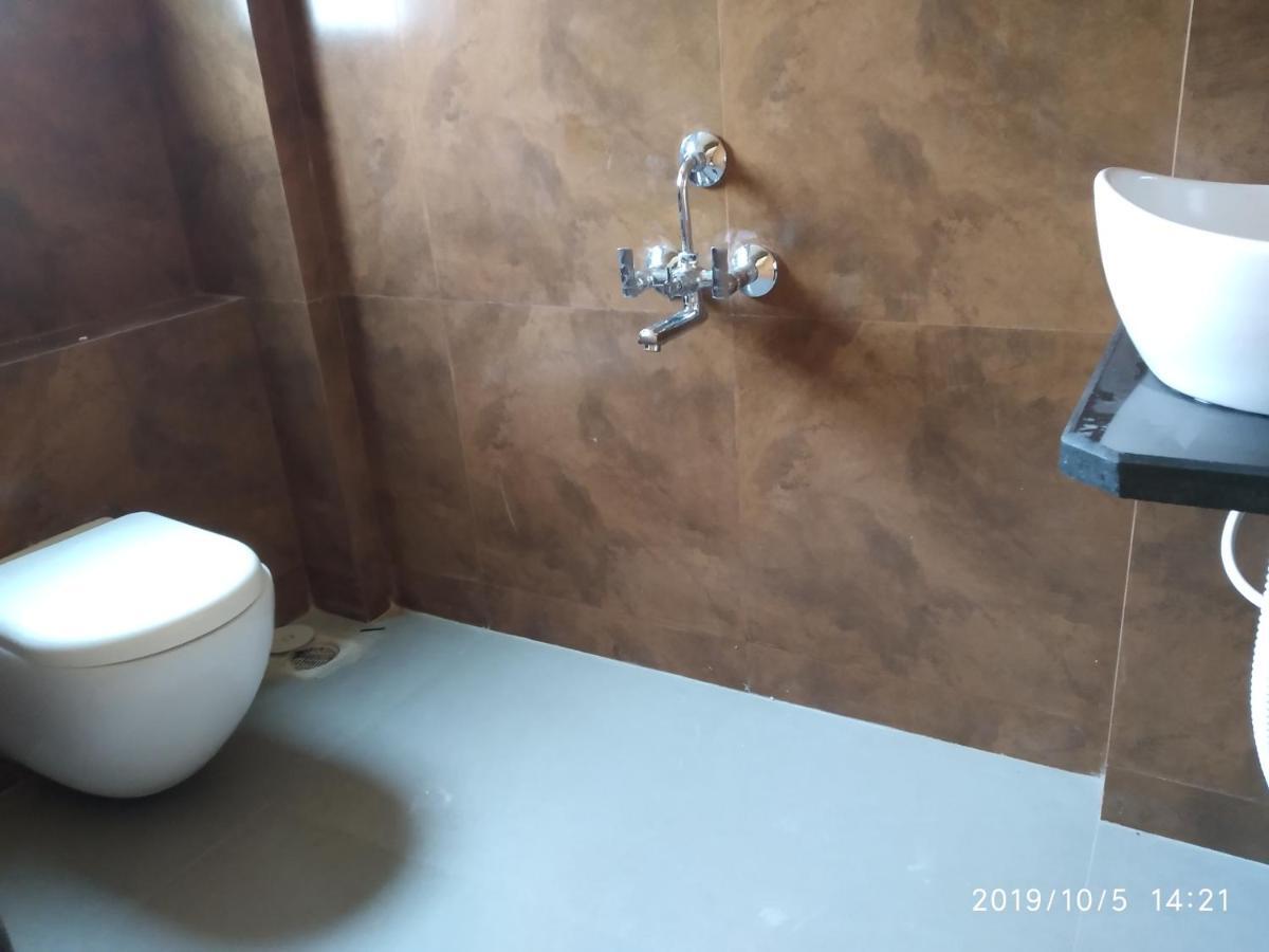 Lotus Hotel Nagaon Beach Alibag Bagian luar foto