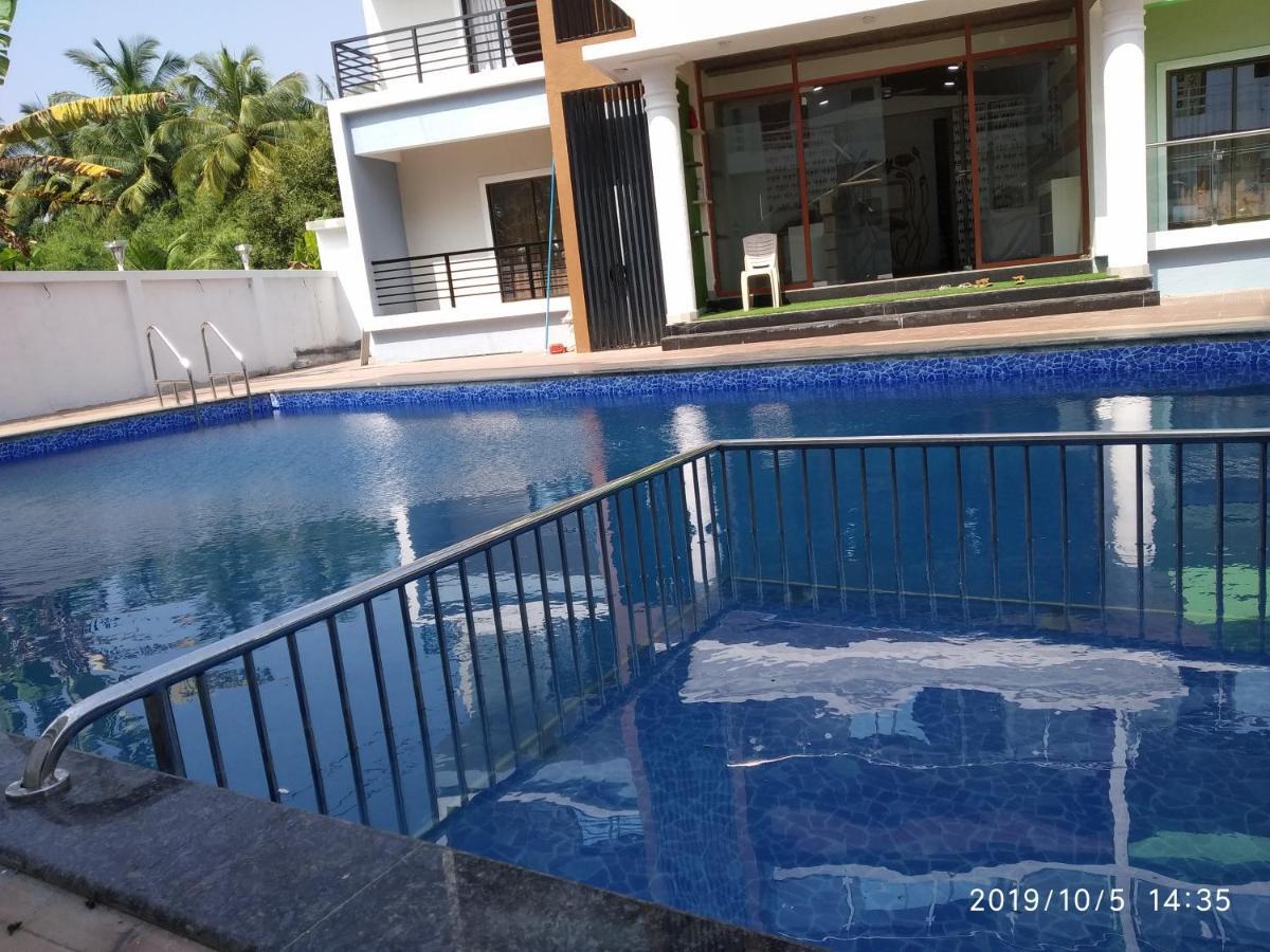 Lotus Hotel Nagaon Beach Alibag Bagian luar foto