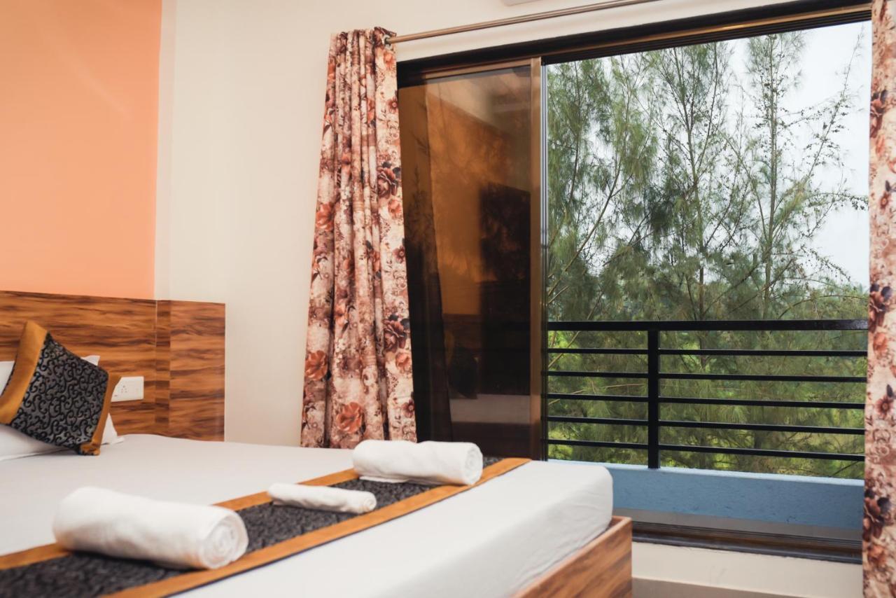 Lotus Hotel Nagaon Beach Alibag Bagian luar foto