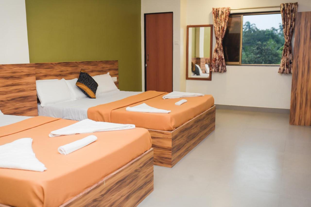 Lotus Hotel Nagaon Beach Alibag Bagian luar foto